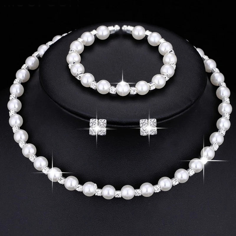Pearl Jewelry Set:               Bracelet, Necklace, Earrings