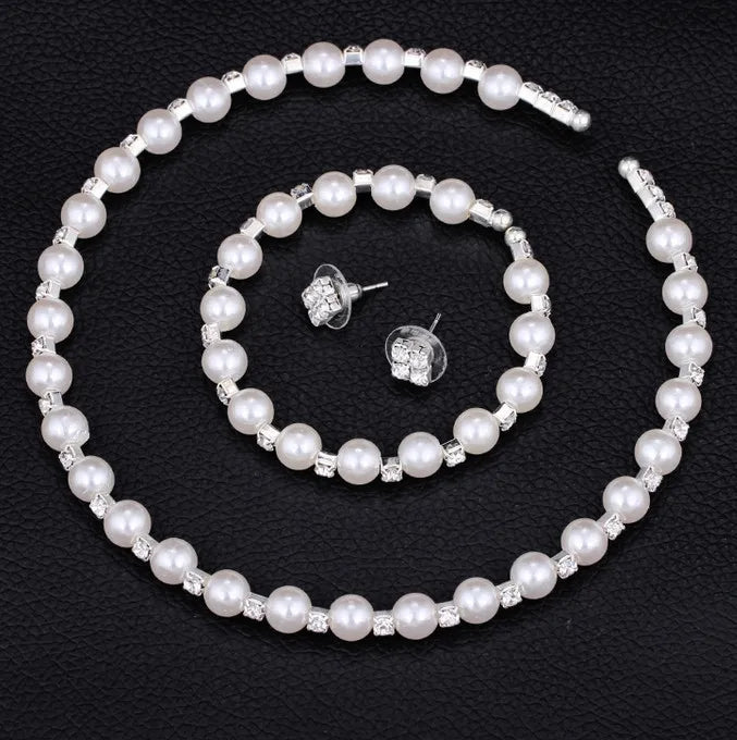 Pearl Jewelry Set:               Bracelet, Necklace, Earrings