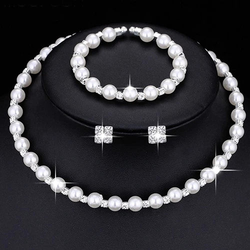 Pearl Jewelry Set:               Bracelet, Necklace, Earrings