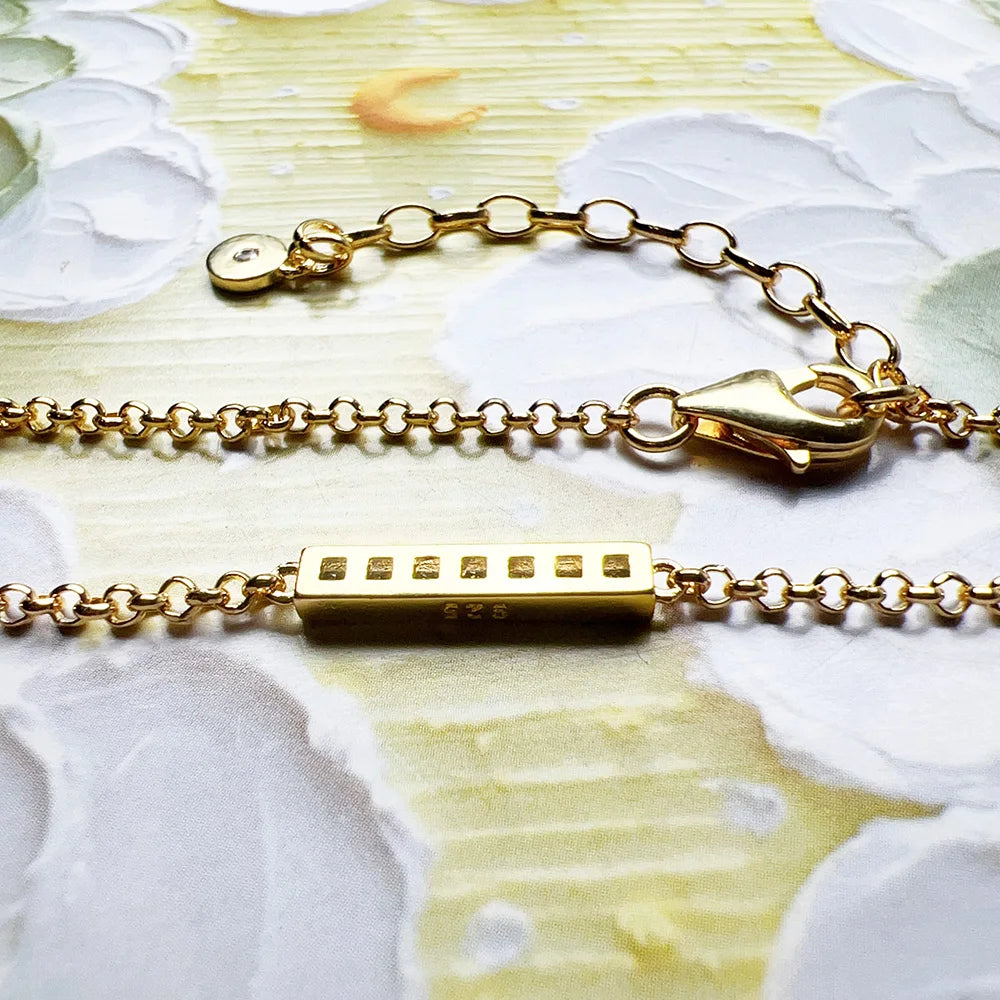 Gold Bracelet with White Stones